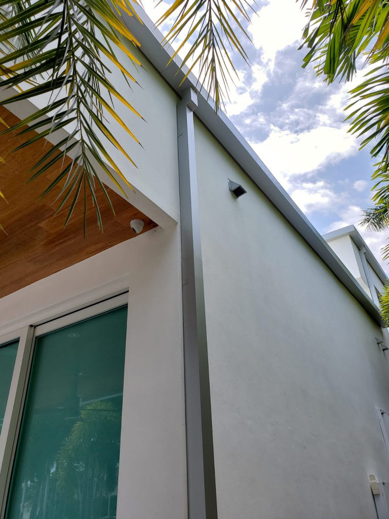 Plain-downspout-rain-shield-gutters